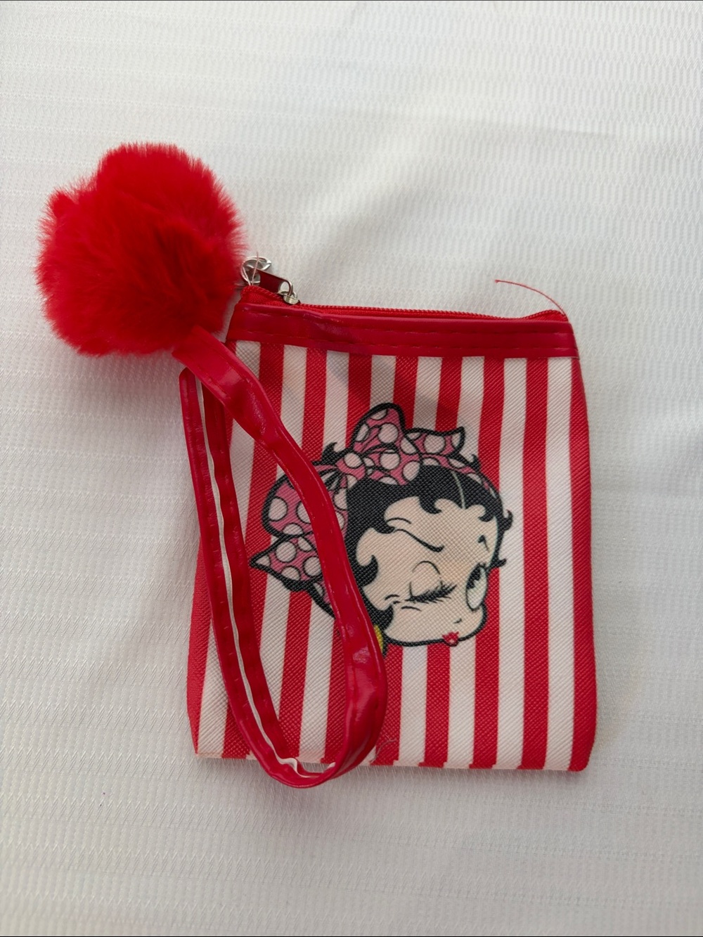 Pick (1) Betty Boop Mini Wristlets with matching pompom
3 1/2” x 4 1/2” - Picture 3 of 5